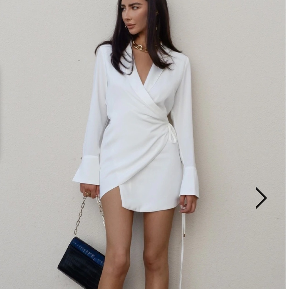 White wrap dress from runaway the label. Size medium. Brand new with tags